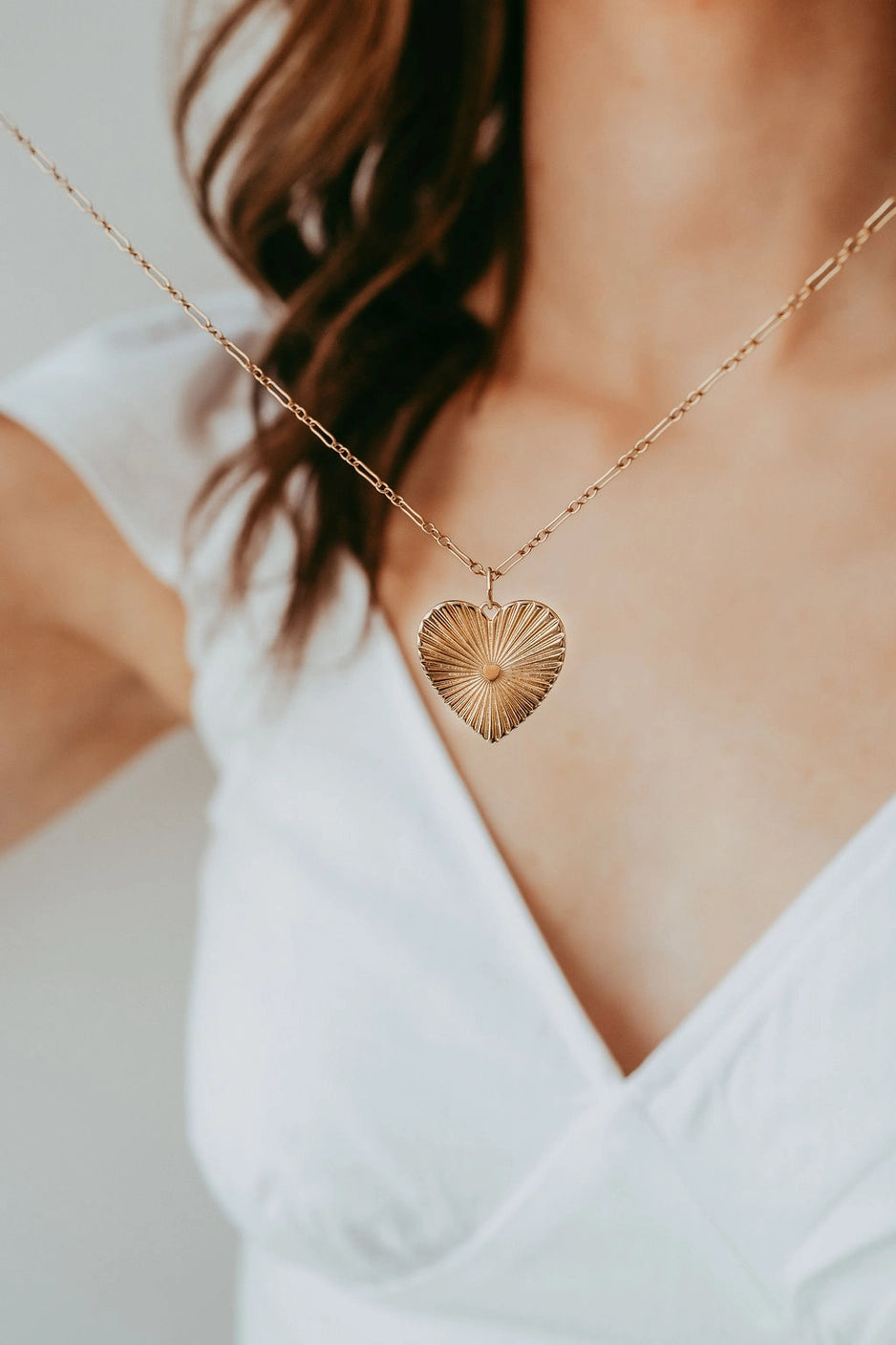 Close-up of 14K gold-filled heart pendant on Darlin' Heart Necklace