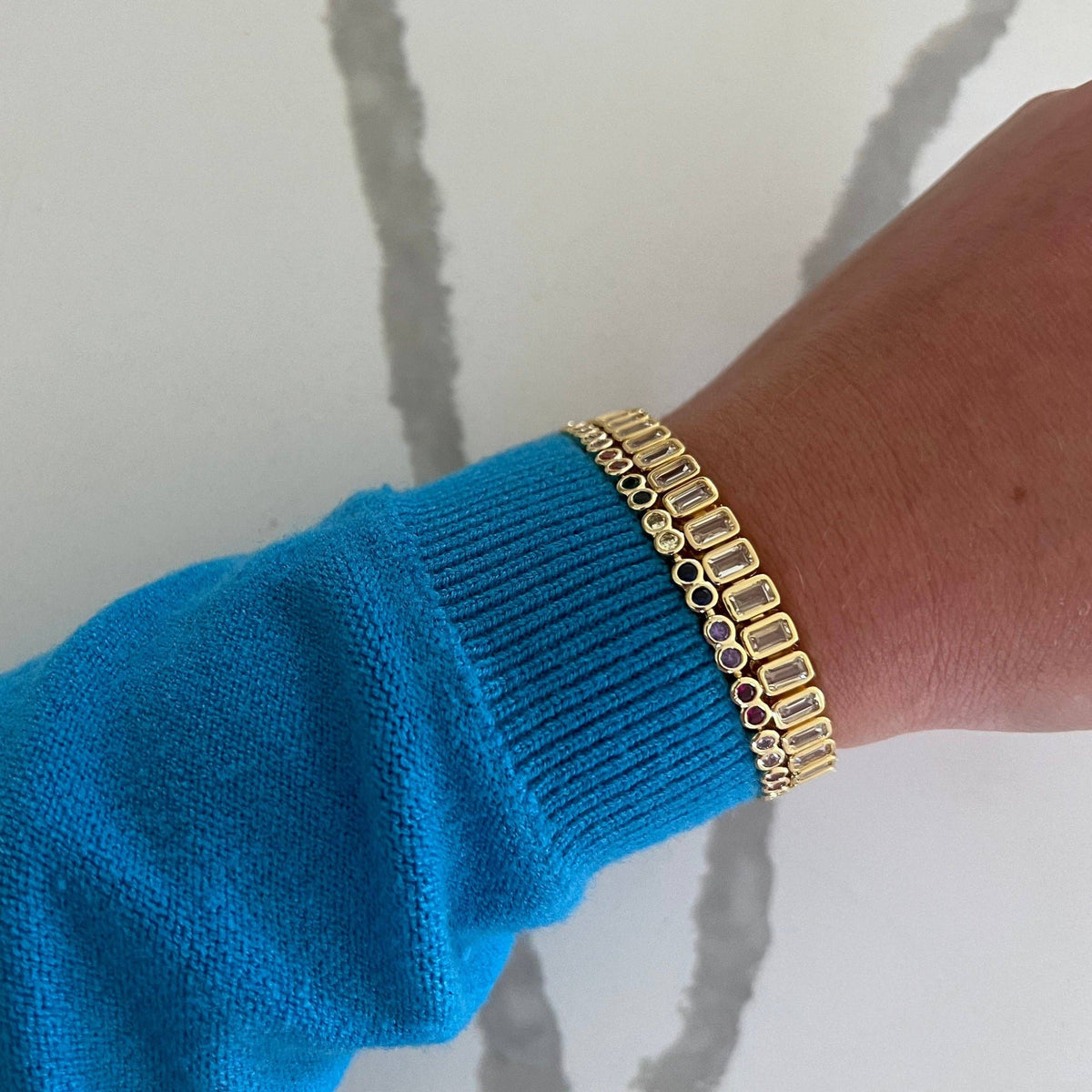 Adjustable gold CZ tennis bracelet with extra clasp for custom fit