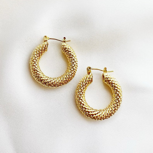 The Capri Twist Hoop Earrings featuring textured 14K gold-filled hoops