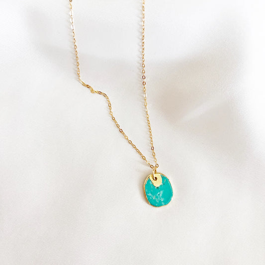 Close-up of genuine turquoise pendant on the Ocean Blue Necklace with gold electroplated setting