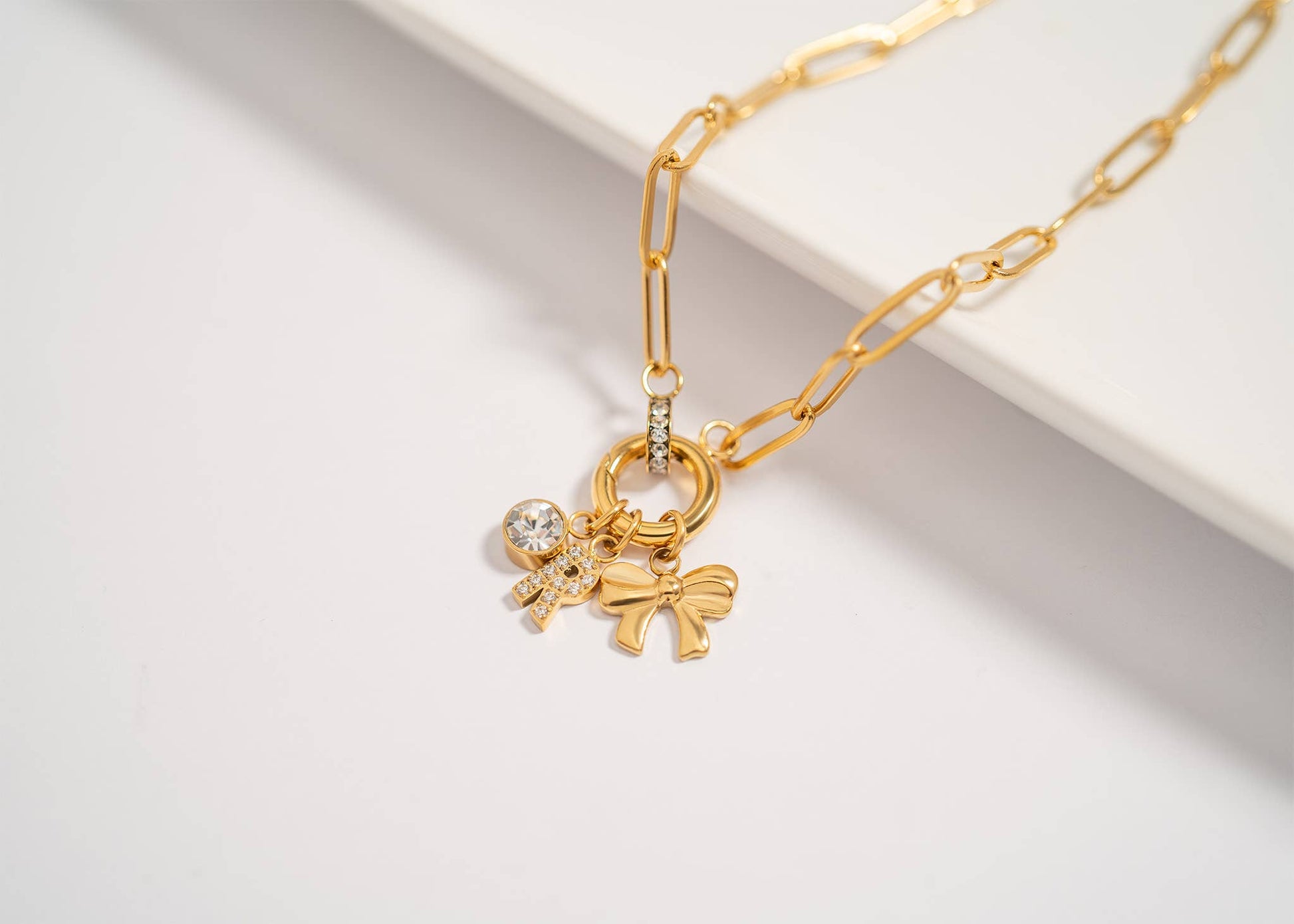 Paperclip charm holder necklace with charms close up