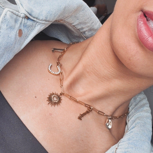 She's From Texas gold charm necklace with Texas boot, cowboy hat, horseshoe, Howdy and heart charms