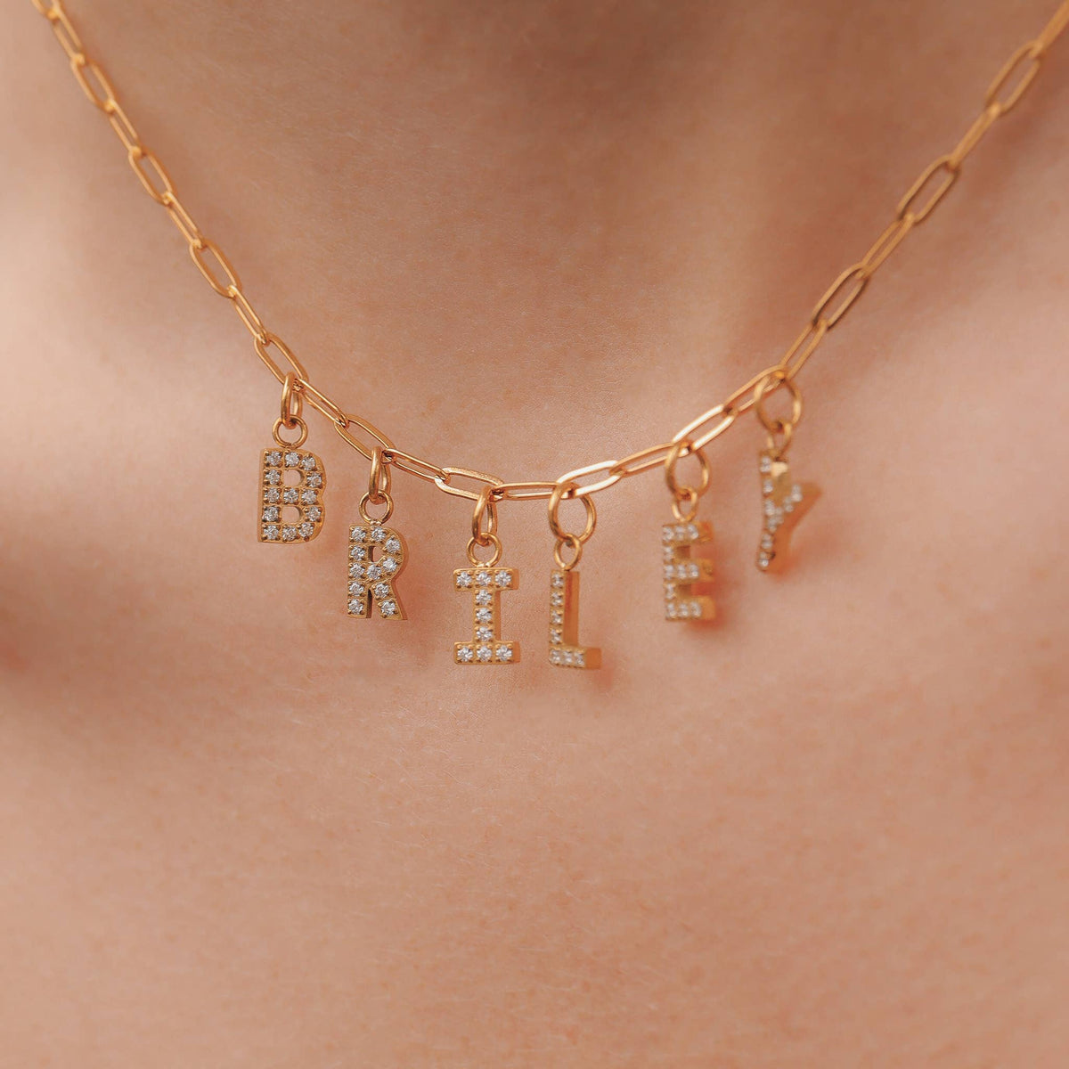 Waterproof gold initial letter charm with pavé CZ stones